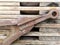 Rusty instrument on a wooden pallet