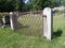 Rusty iron fence guarding the old burial ground of 1745-1791 Boylston, Ma