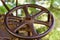 A rusty iron steering wheel