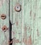Rusty keyholes on the door