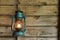 Rusty lantern hanging in a shed