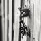 Rusty Lock and Latch on a Wooden Gate