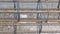 Rusty metal reinforcement bars at construction site - From above of weathered solid metal armature rods for foundation