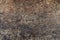 Rusty metal surface, brown with violet gray tint. Closeup of old rust. Horizontal background with copy space for steampunk design