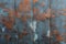 Rusty metal wall background with weathered texture and paint remnants