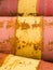 Rusty oil barrels yellow red background pattern