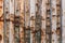 Rusty old background made of thick and narrow details. Corrosion of profile iron