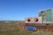 Rusty old Houseboat in estuary