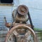 Rusty old machine iron pulley