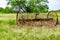 Rusty Old Texas Metal Farm Equipment in Field