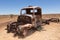 Rusty old truck in desert