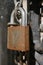 Rusty padlock with chain on a metal gate closeup image, prison law enforcement concept