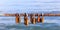 Rusty padlocks closed on peeled railing signaling love. Close up view, blurred background.