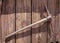 Rusty pickaxe hanging on a wooden wall, Calico ghost town, California