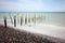 Rusty Posts on Beach