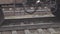 Rusty railway train wheels stand on rails