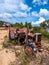 Rusty remains of an agricultural machine outdoors