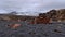 Rusty remains of the wreckage of fishing trawler Epine at DjÃºpalÃ³nssandur beach on west coast of SnÃ¦fellsnes, Iceland.