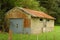 Rusty shed on concrete base