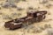 Rusty ship at the ship graveyard in former Aral sea port town Moynaq Mo ynoq or Muynak , Uzbekist