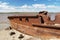 Rusty ship on the shore