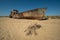 Rusty ship wreck in the deserted Aral Sea near Muynak en Uzbekistan