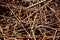 Rusty steel rebar scraps. Stack of rusty iron rods or bars