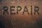 Rusty texture and word Repair