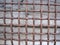 Rusty thick heavy intertwined metal vintage ancient grid