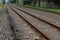 Rusty train tracks with pebbles in Indonesia railways