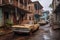 rusty vehicles parked in front of deserted houses