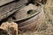 Rusty wheel disk in yard 19667