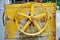 Rusty Yellow V-Belt Pulley of Construction Equipment