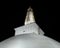 Ruwanwelisaya stupa glowing in the night, it is a hemispherical structure and containing sacred Buddha`s relics built by King