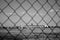 Ruzyne, Czech republic - August 16, 2018: building of Vaclav Havel airport in Prague and flying aeroplane viewed behind fence duri