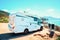 RV Camper Car at the Mediterranean Sea in Sardinia. Caravan and motorhome in trip in Italy