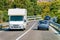 Rv cavaran and cars in road in Costa Smeralda Sardinia