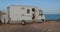 RV, Recreational vehicle, camping at the beach.