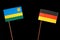 Rwanda flag with German flag on black