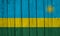 Rwanda Flag Over Wood Planks