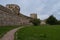 Ryabinovka Tower and Vyshka Tower with wall in medieval Izborsk fortress. Izborsk, Pskov region, Russia