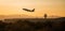 Ryanair plane departing in sunset