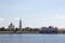 Rybinsk. View of the building of the grain exchange, the Holy Transfiguration Cathedral and the bridge over the Volga river. View