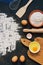 Rye flour, rolling pin, whisk, paddle, eggs, cutting board.Ingredients for baking rye bread. View from above. Place for text.