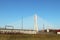 Rzeszow, Poland - 9 9 2018: Suspended road bridge across the Wislok River. Metal construction technological structure. Modern arch