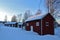 RÃ¥neÃ¥s church cottages in winter coats