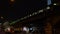 S-Bahn train leaving Alexanderplatz Station at night by the Television Tower, Berlin, Germany