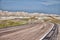 S curved paved road through the badlands of South Dakota