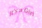 It`s a girl, birth announcement with pink ribbon and sparkle pink background.