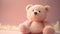 It\\\'s a Girl. Pink teddy bear stuffed animal on baby pink studio backdrop. Newborn daughter. Baby announcement.